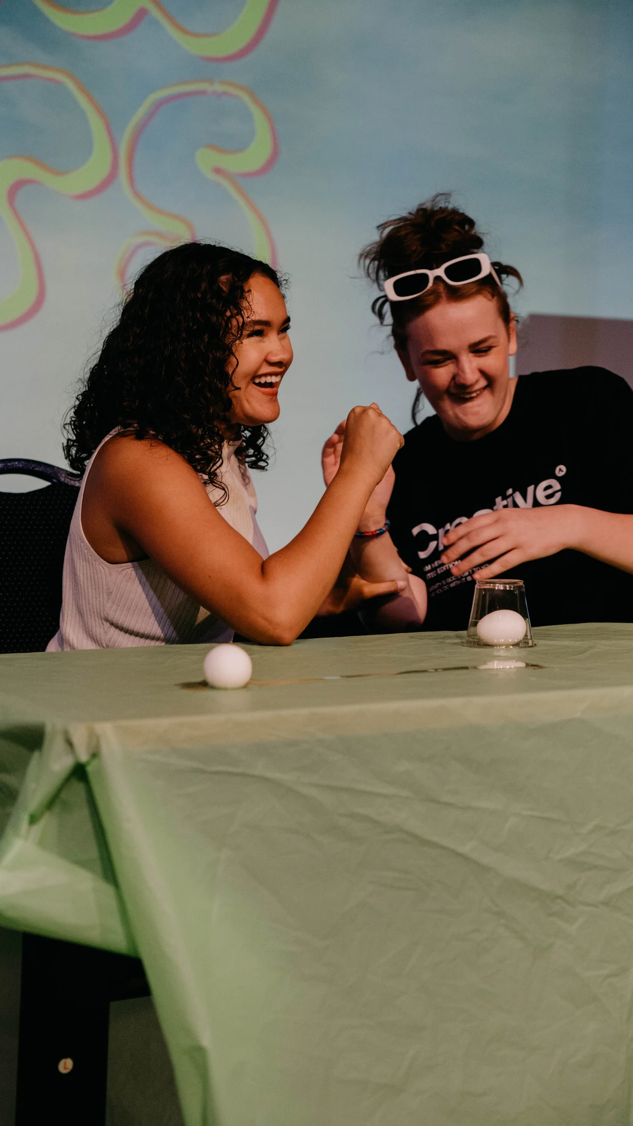 Students laughing together at Avenue Youth