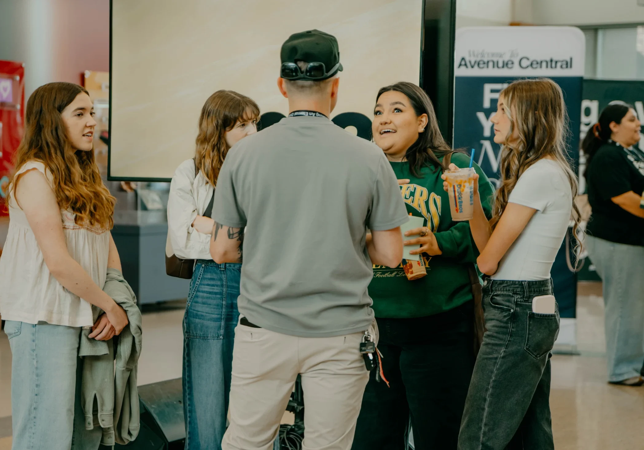 People connecting in the Avenue Church lobby