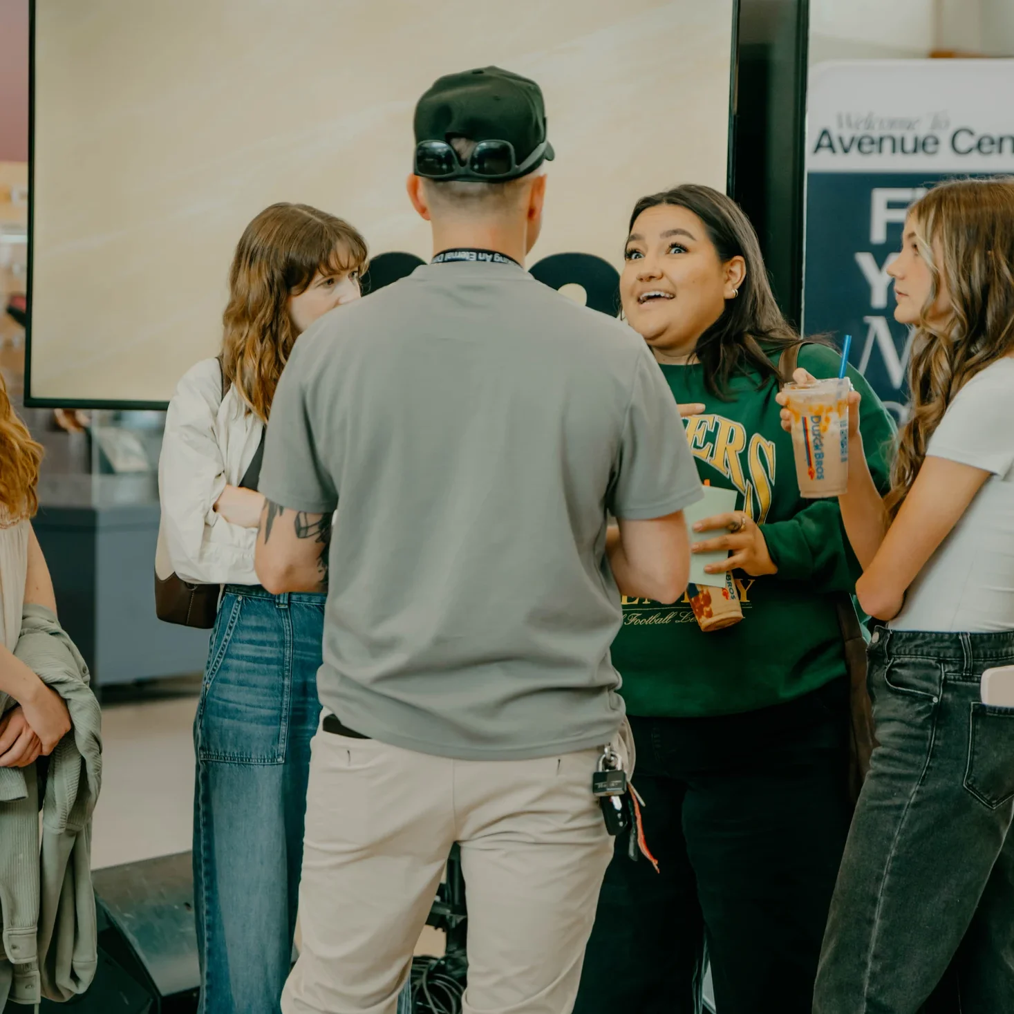People connecting in the Avenue Church lobby